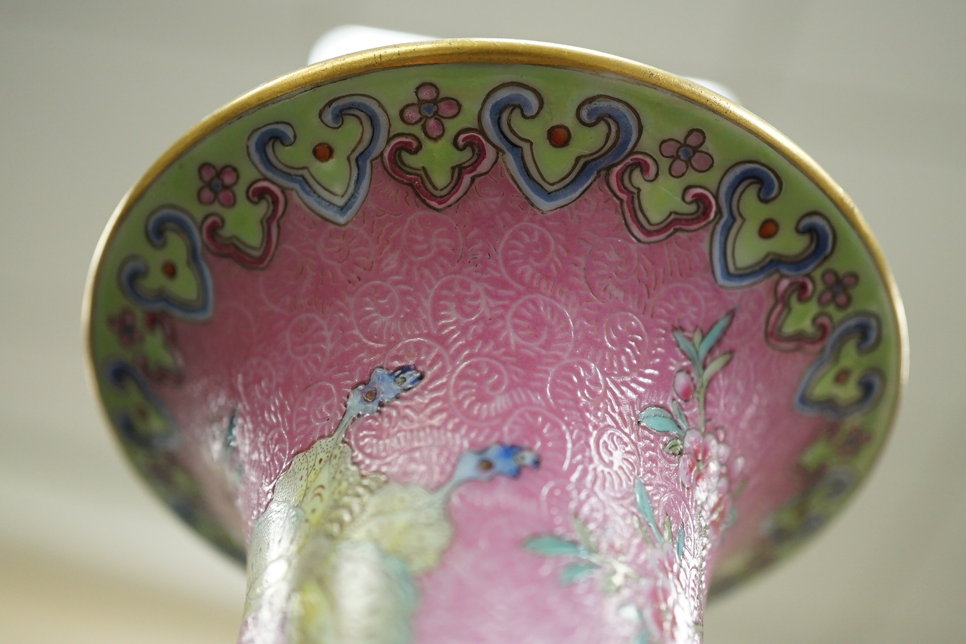 A Chinese pink-ground sgraffito pear-shaped vase, yuhuchunping, Daoguang six character seal mark and of the period (1821-50)